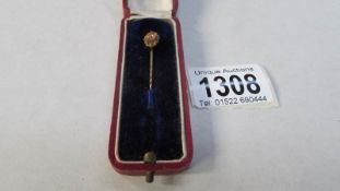 A Victorian gold stick pin