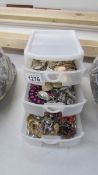 A small 3 drawer chest of assorted costume jewellery