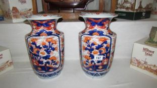 A pair of large Imari vases,