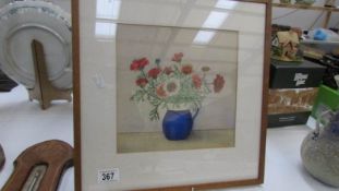 A framed and glazed watercolour of flowers signed Edward W White 1953,