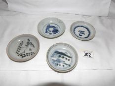 4 early Chinese blue and white dishes including one with a dragon and one with a bird,