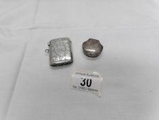 A silver vesta case and a silver pill box