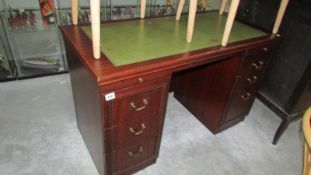 A mahogany kneehole desk