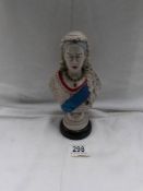 A hand painted bust of Queen Victoria