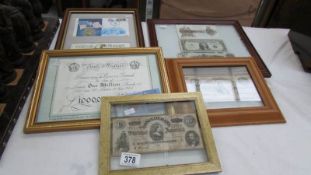 A framed and glazed J F K coin and stamp collage and 4 other framed notes including £1,000,