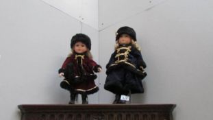2 porcelain collector's dolls