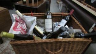 A picnic basket containing 6 bottles of wine
