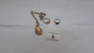 2 9ct gold rings and a 9ct gold locket on a yellow metal chain