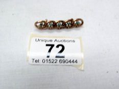 A turquoise and pearl set brooch fashioned as forget me nots