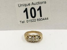 An 18ct yellow gold 3 stone 40pt diamond ring