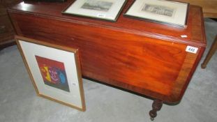 A Victorian mahogany cross banded Pembroke table