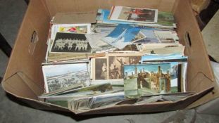 A large box of post cards
