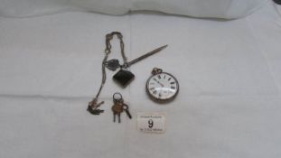 A silver pocket watch,