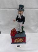 A cast iron 'Uncle Sam' mechanical money box