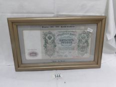 A framed Russian 1912 500 rouble bank note,