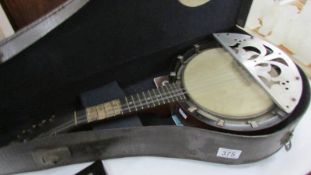 A cased Dulcetta banjo