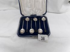 A cased set of 6 silver coffee spoons