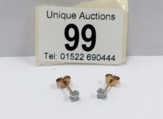 A pair of 20pt white gold diamond ear studs