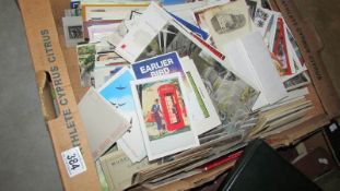 A large box of postcards