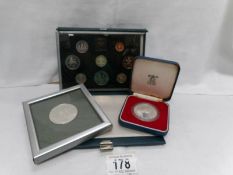 A cased set of UK decimal coins,