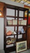 A good quality solid mahogany shelf unit