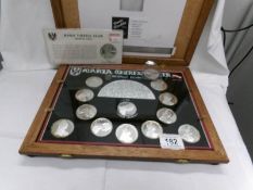 A cased Maria Theresa Taler proof restrike collection and to othe Maria Therese Taler proof coins