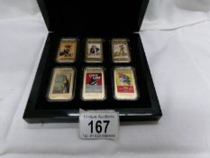 A cased set of WW1 commemorative poster coins