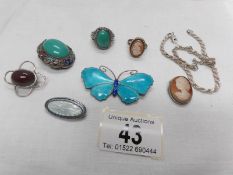 A mixed lot of silver jewellery including brooches,