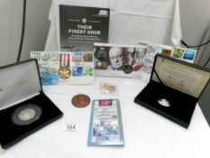 A collection of coins commemorating WW2