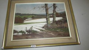 An oil on board winter landscape with snow on fields signed Breley '77