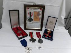 A collection of replica German medals