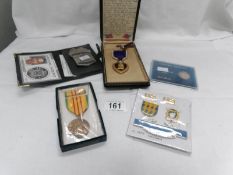 A collection of replica USA medals including Purple Heart