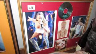 A framed and glazed Kylie Minogue collage