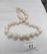 An ivory bed necklace (recently restrung)