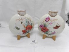A super pair of hand decorated moon vases marked J Derbyshire, decorator,
