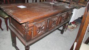 A carved oak sideboard