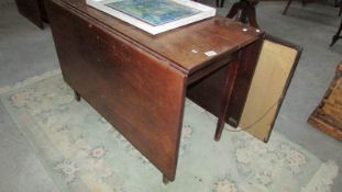 An inlaid drop leaf table,