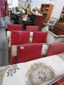 6 red leather backed/seats wooden chairs