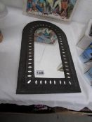 A metal framed mirror