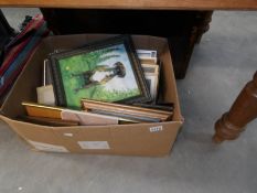 A box of assorted pictures