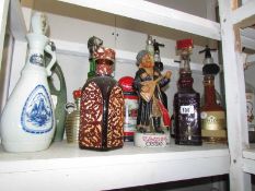 A mixed lot of novelty decanters,