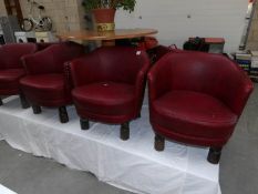 A set of 6 red faux leather tub chairs