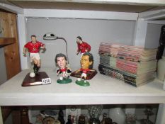 A quantity of Manchester United football programmes and footballer figures