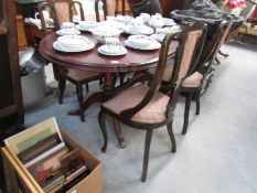 A dining table with claw feet