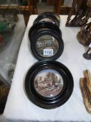 5 framed pot lids,