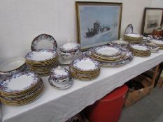 Approximately 100 pieces of Victorian dinner ware including platters and tureens