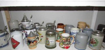 A large quantity of ceramic tankards and beer steins