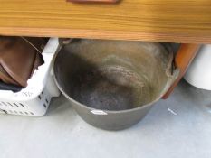 A heavy handled brass bucket / pail