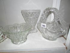 A cut glass vase,