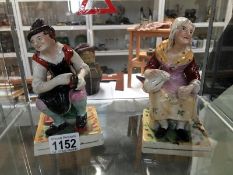 A pair of 19th century Staffordshire figures